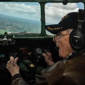image of veteran pilot flying plane 