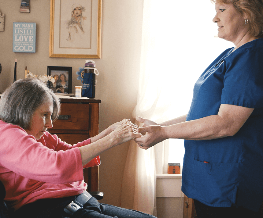Home Helpers caregiver assisting senior client