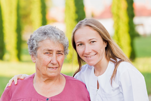 Caregiver and elderly woman