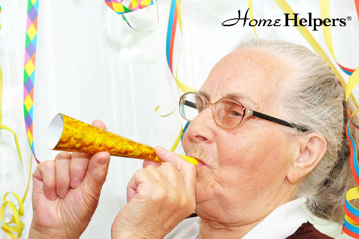 elderly woman celebrating New Years